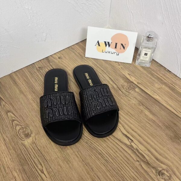 MIUMIU Flat bottomed open toed flip flops