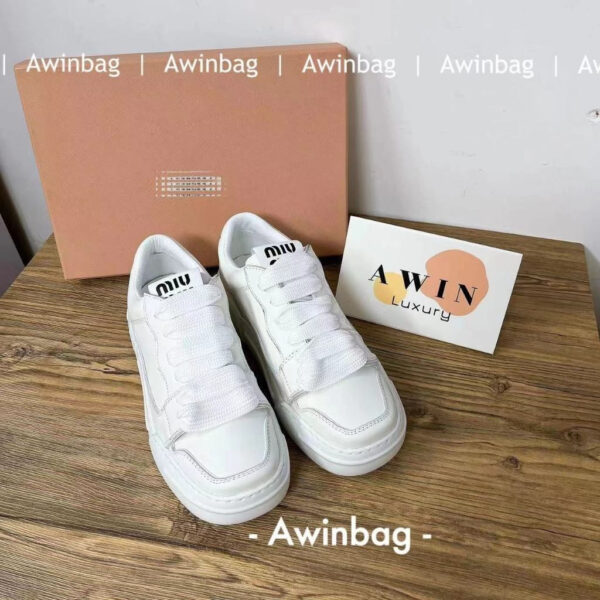 MIUMIU Round head lace up low top board shoes