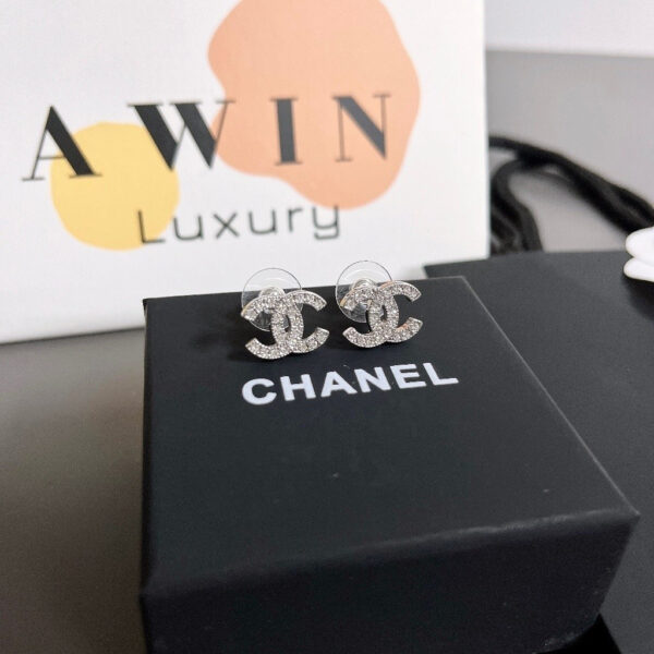 CHANEL Double C metal stud earrings for women